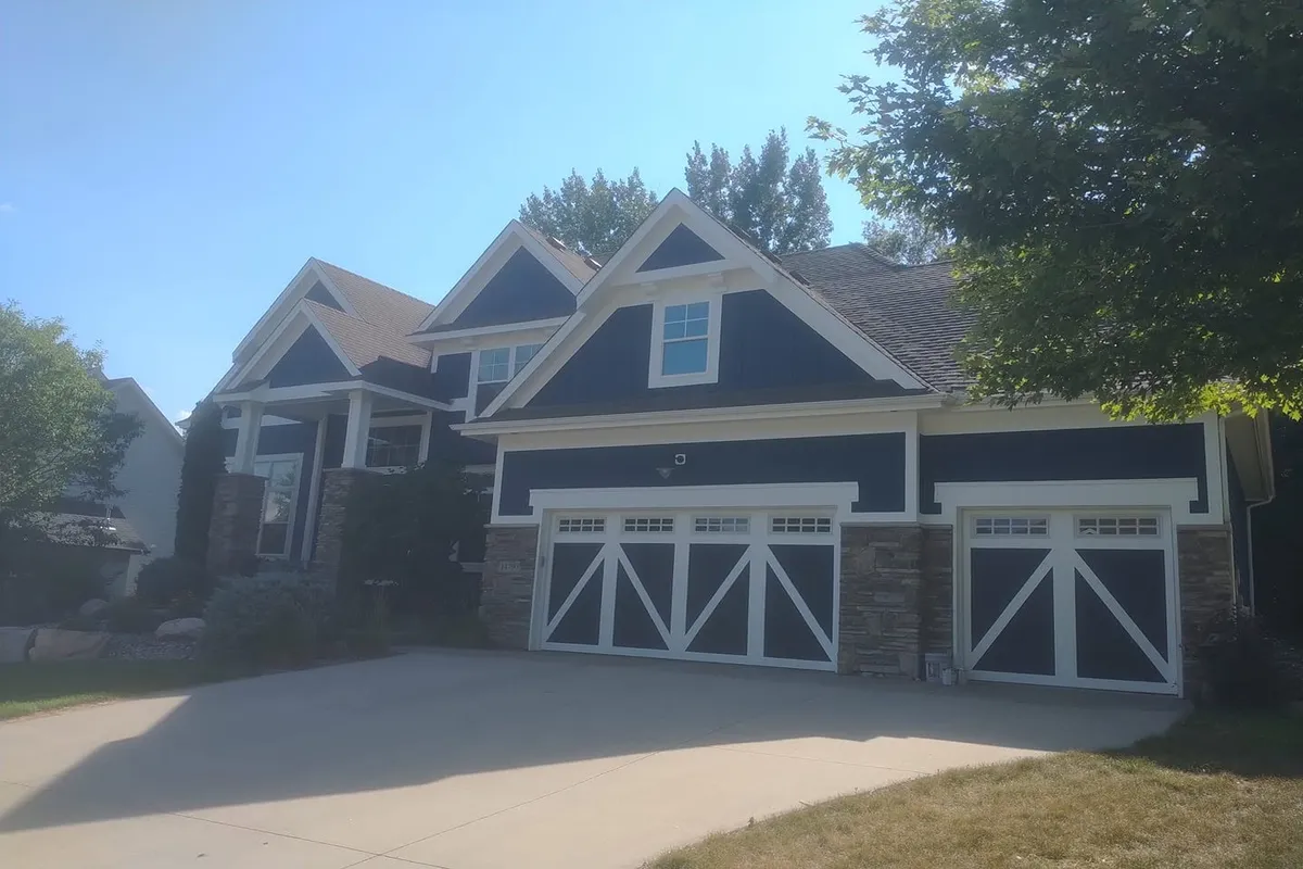 Home exterior painted blue in St Paul