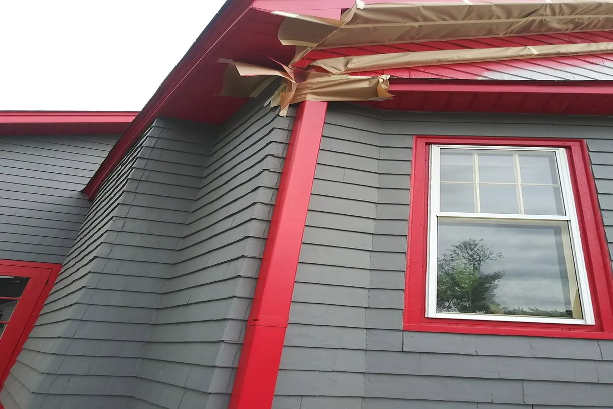 Home exterior with bright red parts